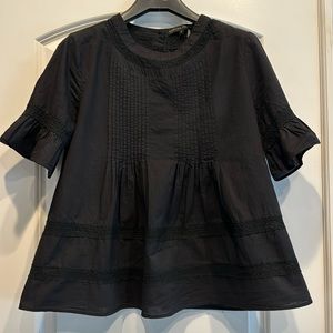 Black short sleeve slight peplum blouse